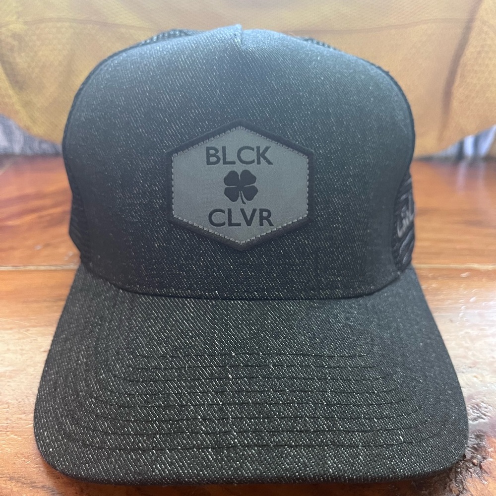Live lucky black trucker hat